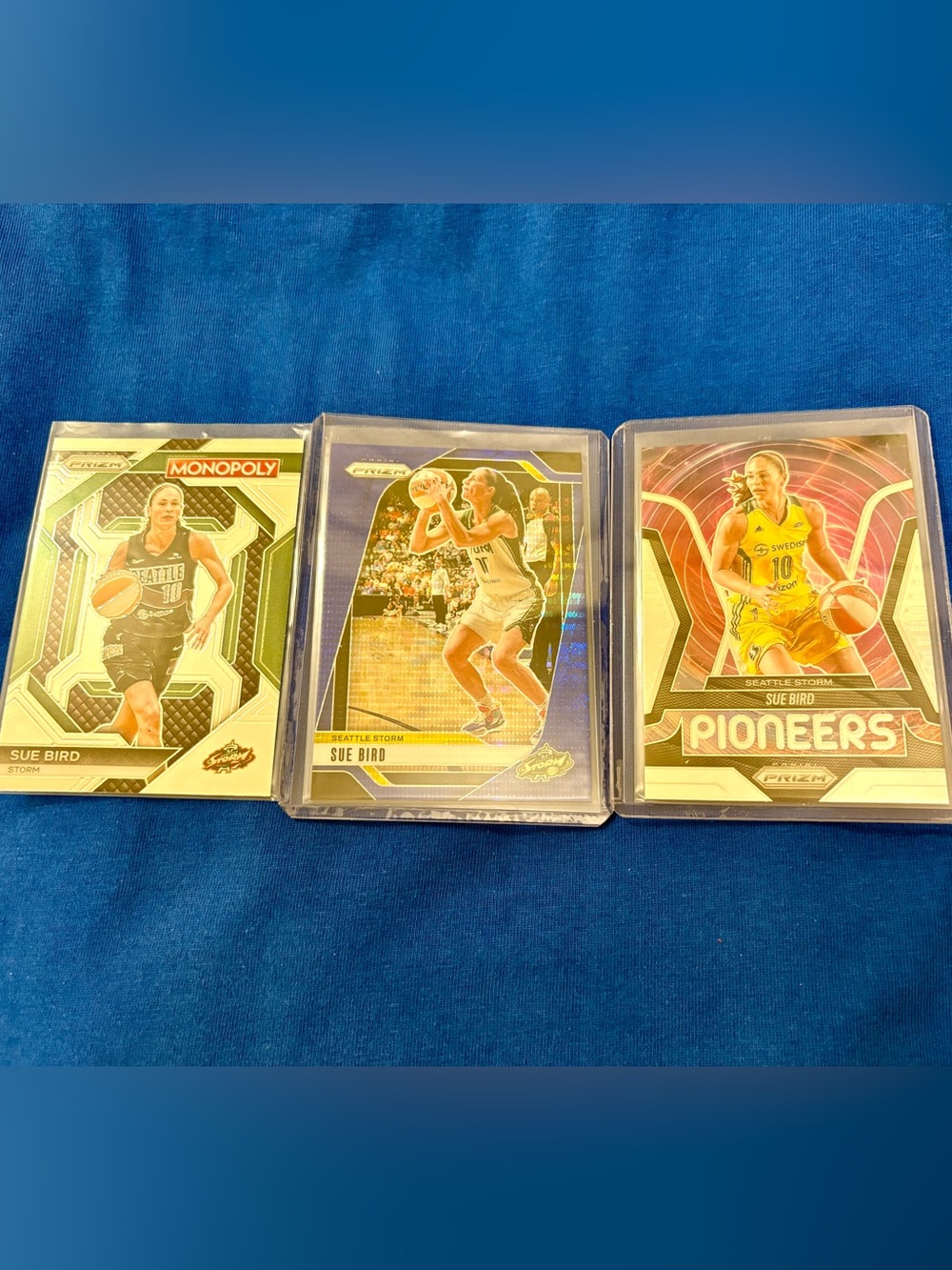Sue Bird Basketball Cards a Blue Pulsar Prizm 110/199 and Panini Pioneers card